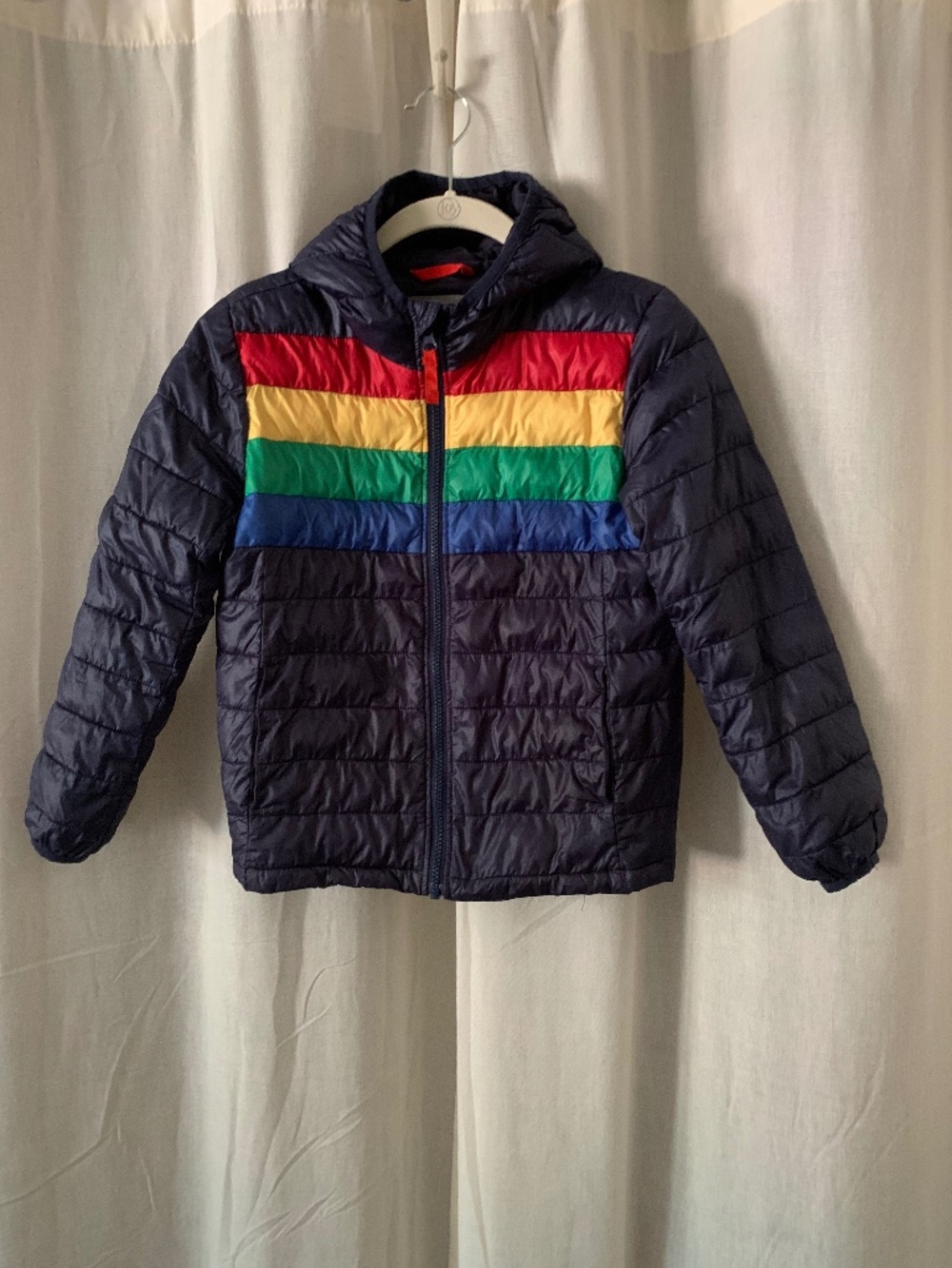 Primary Kids Puffer Jacket In Rainbow Stripe in Navy Bold Rainbow Size 8-9